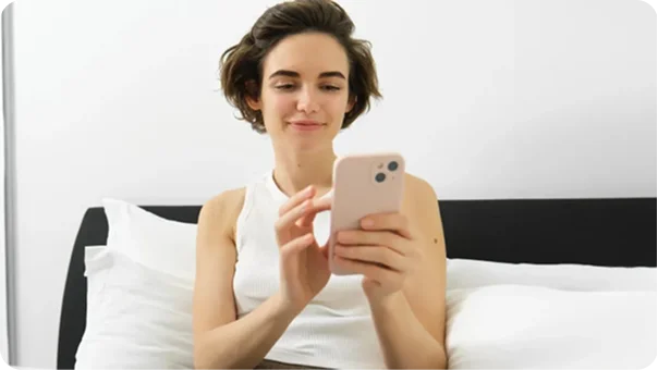 Woman receiving specialist referral on phone-hero